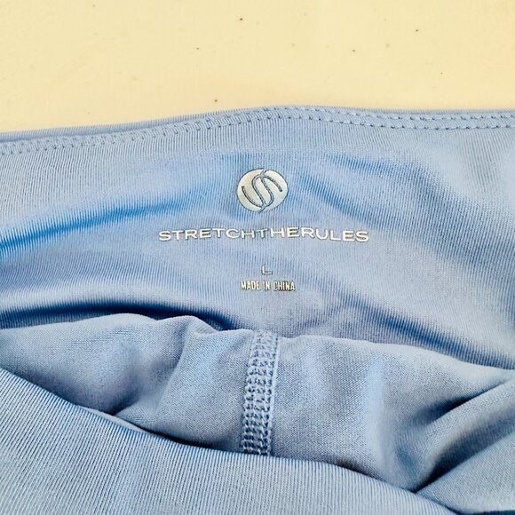 STRETCH THE RULES PLEATED GOLF SKORT SKIRT WITH UNDER SHORT BLUE - Picture 4 of 6